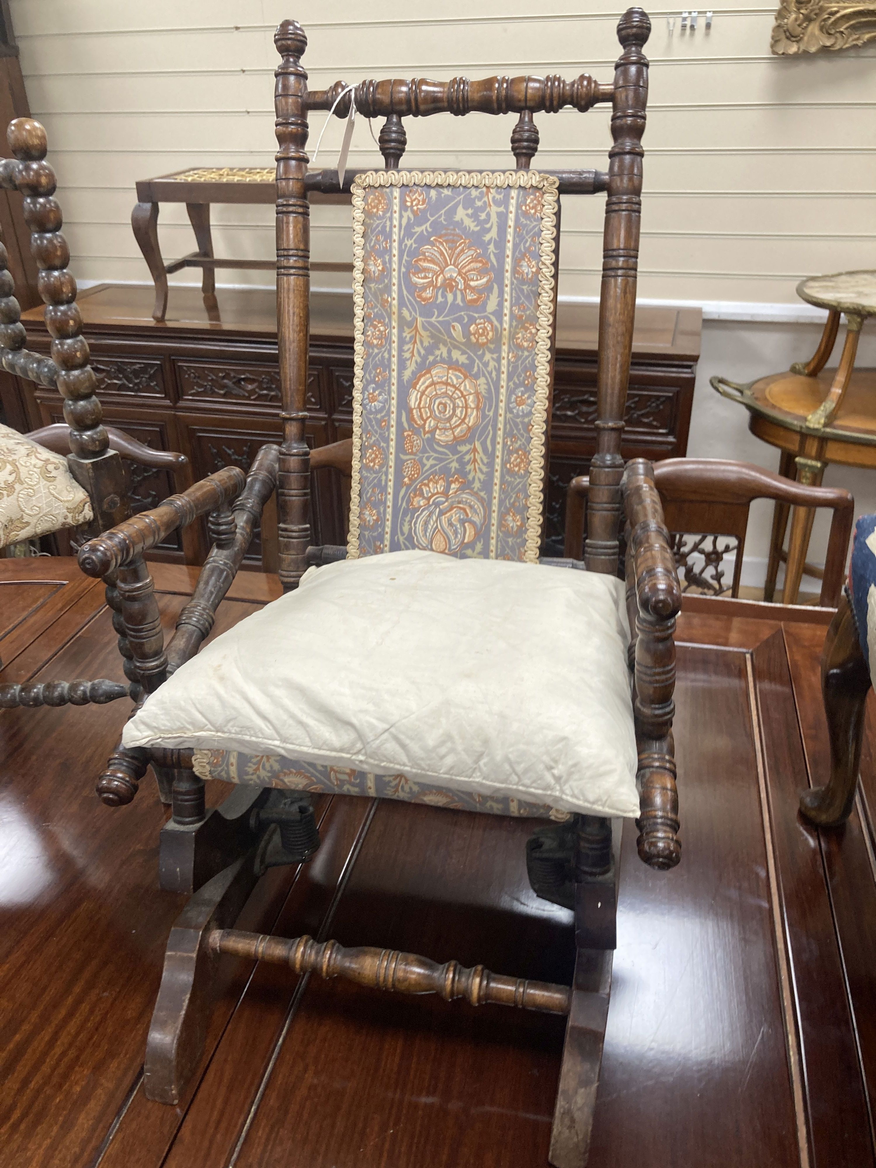 A Victorian childs rocking chair, width 33cm, depth 47cm, height 74cm together with a Victorian bobbin turned corner armchair, width 5